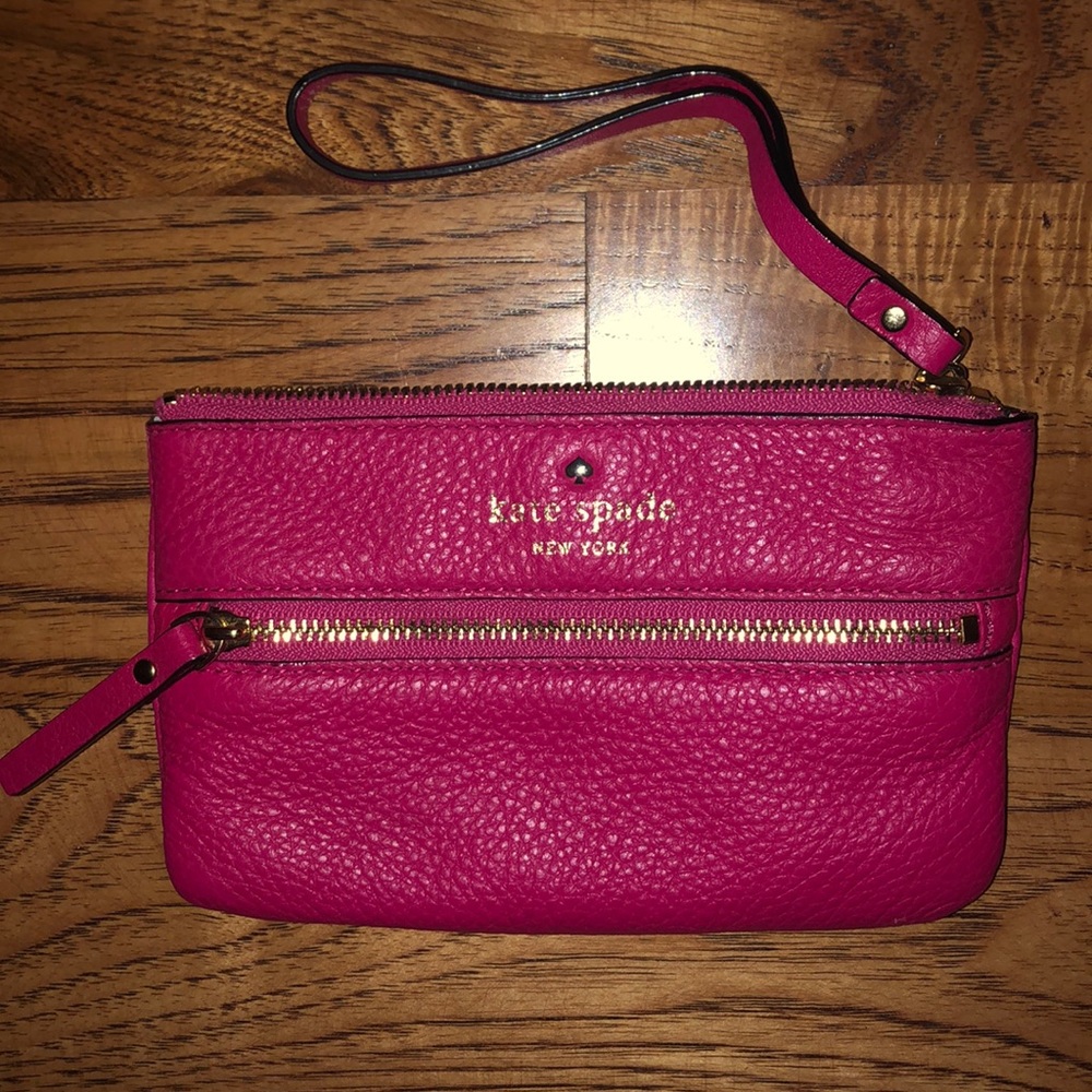 Bright pink Kate spade wristlet